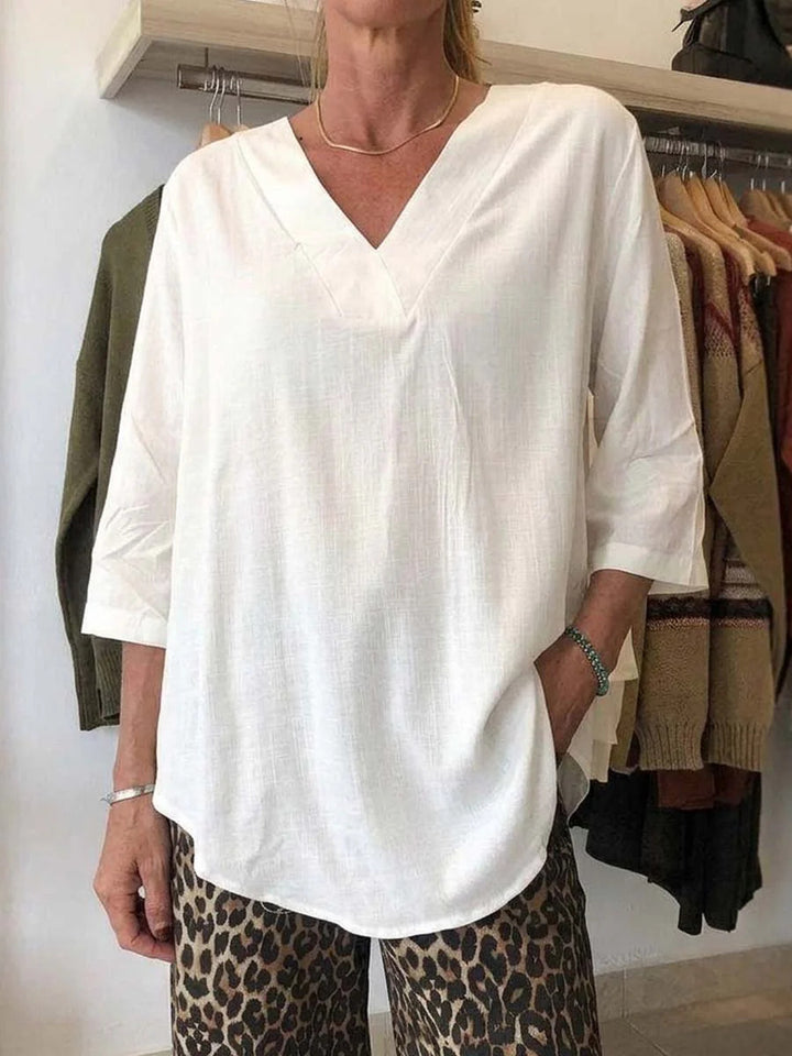 Damen Leichte Oversize V-Ausschnitt Tunika in Leinenoptik mit dreiviertel Ärmeln und abgerundetem Saum – Avérine