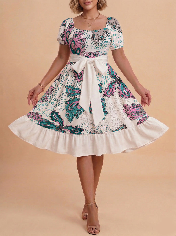 Damen modernes Blumenkleid mit elegantem Taillengürtel und asymmetrischem Saum Echo Archiv