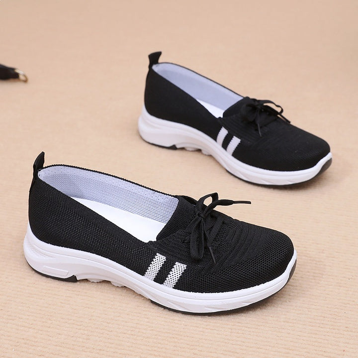 Damen Schlupf-Strick-Sneaker mit dekorativer Schleife und gedämpfter Plateausohle – Névara
