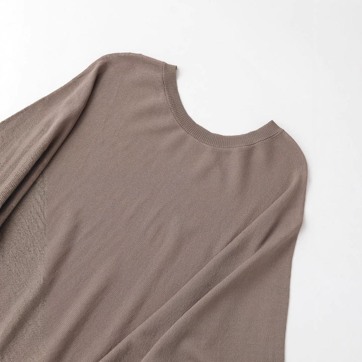 Damen Midikleid mit weitem Poncho-Oberteil und Ballonärmeln Echoarchiv