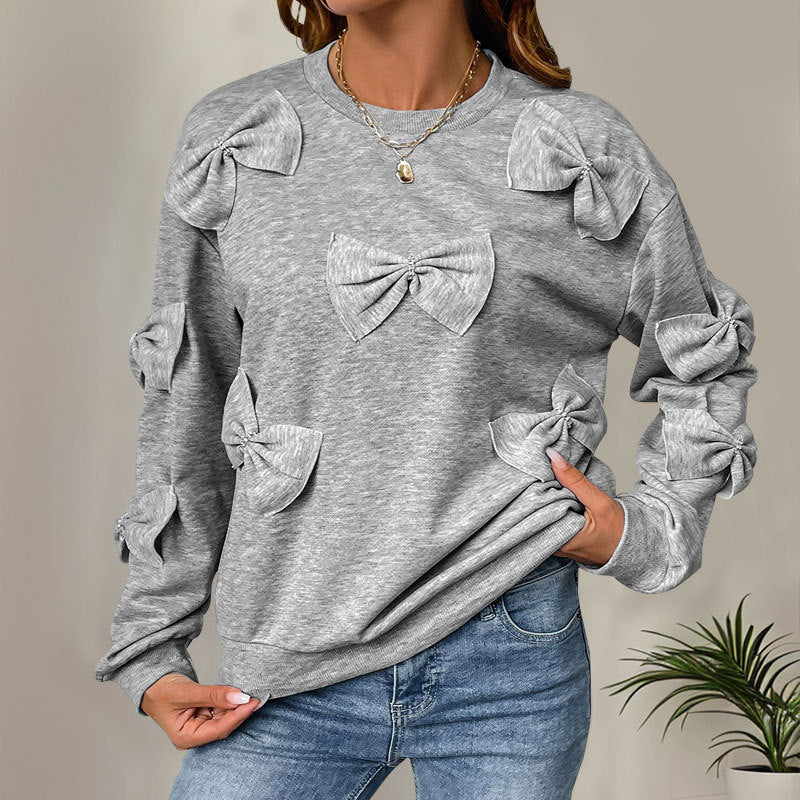 Damen Kuschel-Sweatshirt mit 3D-Schleifenapplikationen, Rundhals & Rippbündchen Echoarchiv
