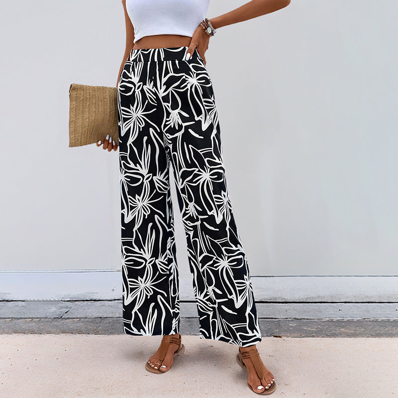 Damen Hochtaillierte Weite Hose mit floralem Muster Echo Archiv