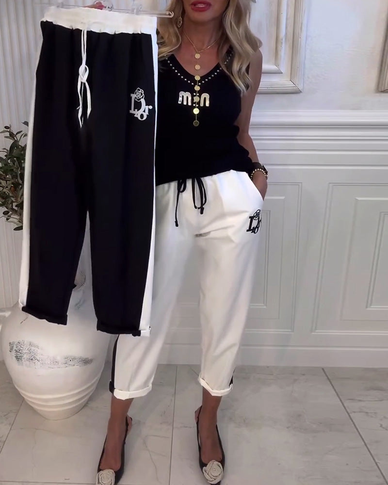 Damen nan Cropped-Jogginghose mit kontrastierendem Bund, seitlichem Zierstreifen, Kordelzug und Logostickerei Echo Archiv
