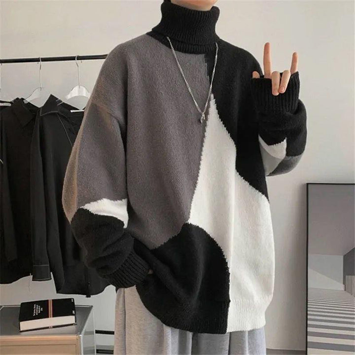 Herren Grobstrickpullover mit hohem Kragen und modernen Farbblocks Echoarchiv