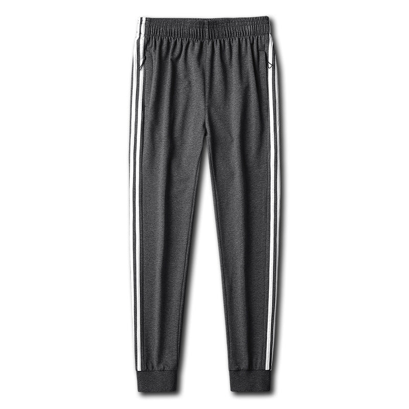 Herren Slim-Fit Trackhose mit seitlichen Kontraststreifen, Reißverschlusstaschen und elastischem Bund – Sorevano