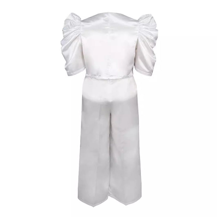 Damen Elegantes Jumpsuit mit voluminösen Puffärmeln und schickem Taillierungsdetail Echo Archiv