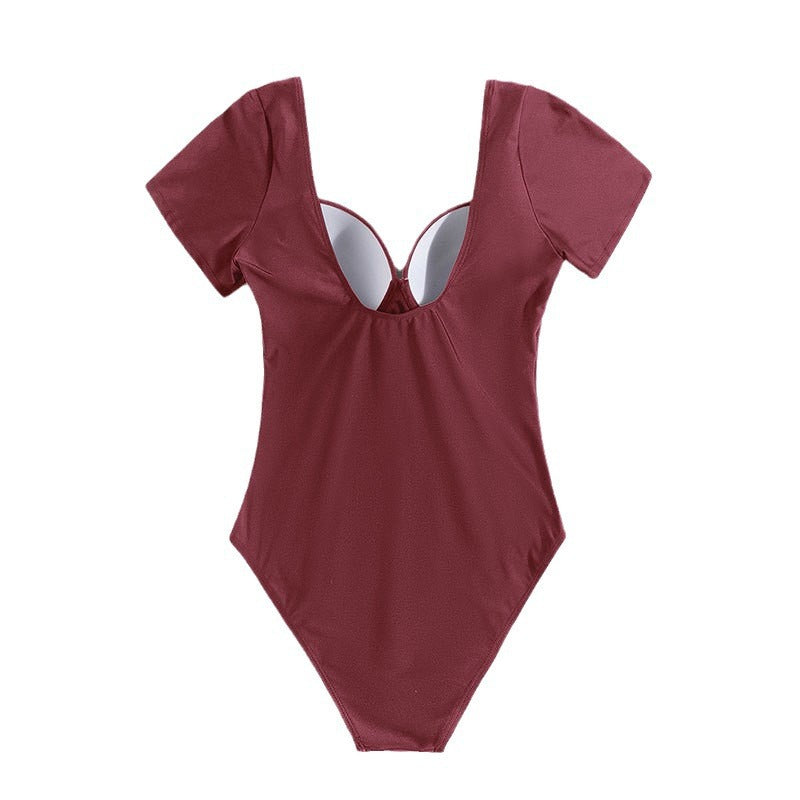Damen Einteiler Badeanzug mit eleganten Trägern und sculpturalem V-Ausschnitt Echo Archiv