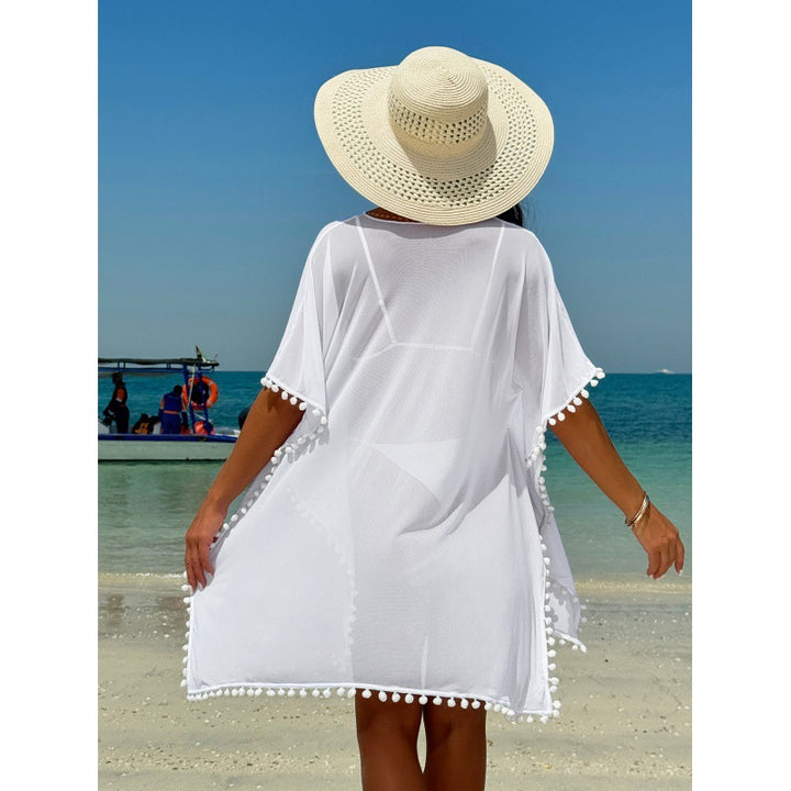 Damen Strandkleid mit dekorativem Pompon-Besatz und elegantem V-Ausschnitt Echo Archiv