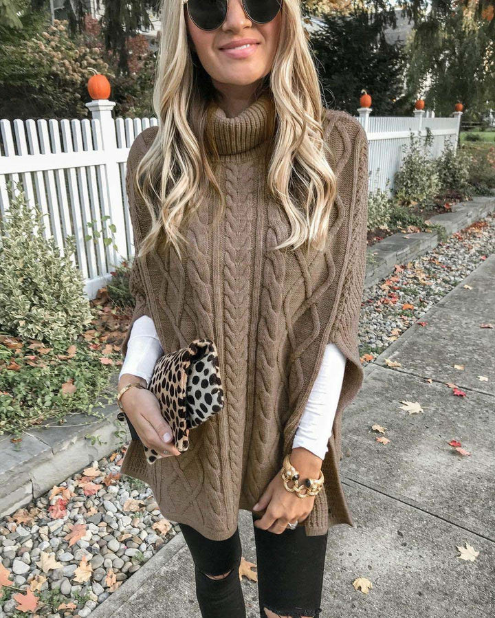 Damen nan kastiger Strickponcho mit hohem Rollkragen, Zopfstruktur und seitlichen Schlitzen Echo Archiv