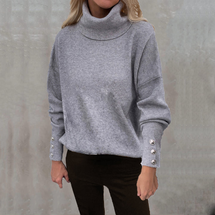 Damen Gerippter Rollkragenpullover mit Oversize-Schnitt und Zierknopfmanschetten Echoarchiv