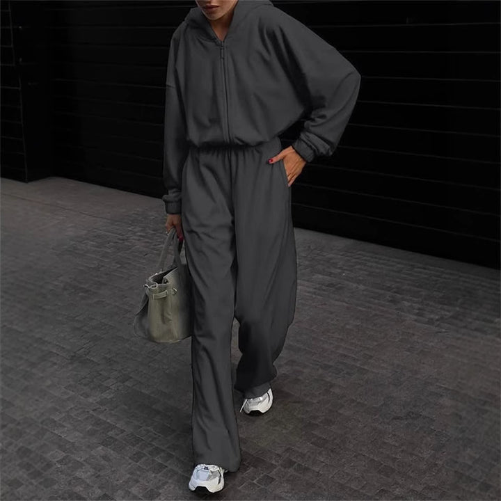 Damen Kapuzen-Jumpsuit mit weitem Bein elastischer Taille und Frontreißverschluss – Solévia