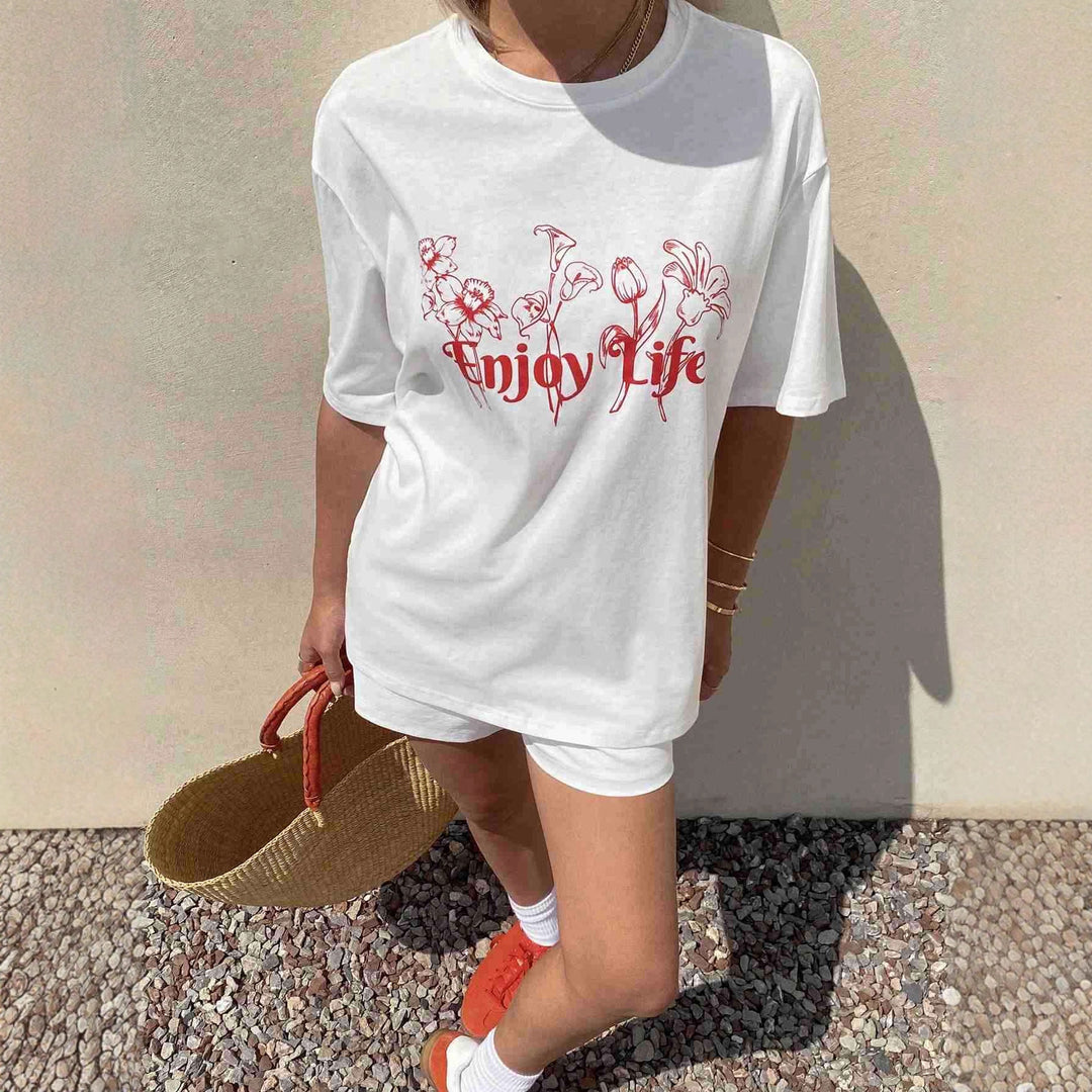 Damen Lässiges Oversize-T-Shirt mit floralem Druck und inspirierendem Schriftzug Echo Archiv