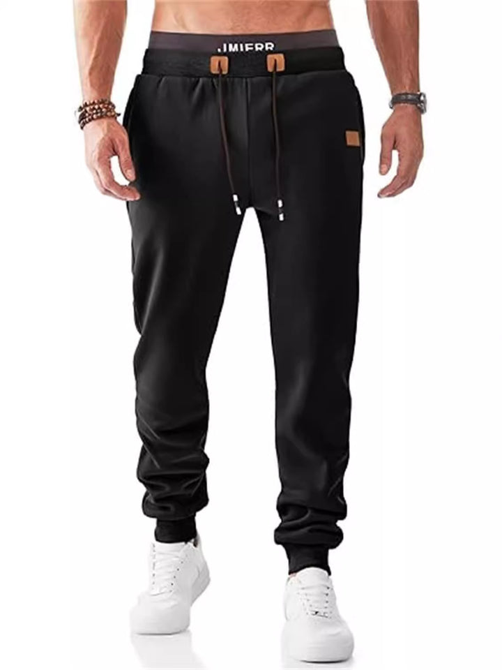 Herren Komfortable Jogginghose mit verstellbarem Bund und seitlichen Reißverschlusstaschen Echoarchiv