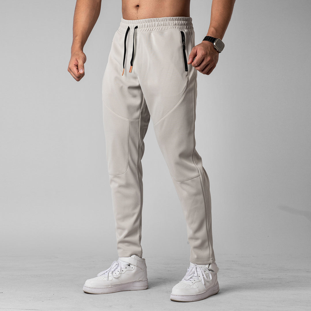 Herren Sportliche Jogginghose mit innovativer atmungsaktiver Struktur und praktischen Reißverschlusstaschen Echoarchiv