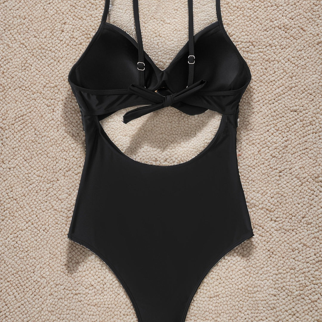 Damen Einteiliger Badeanzug mit modernem Cut-Out und elegantem Wickeldesign Echo Archiv