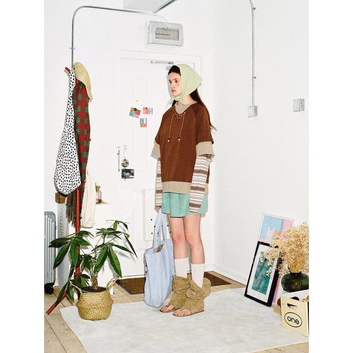 Damen Lagenlook-Sweatshirt mit Schnürung, gestreiften Ärmel-Einsätzen und asymmetrischem Saum Echoarchiv