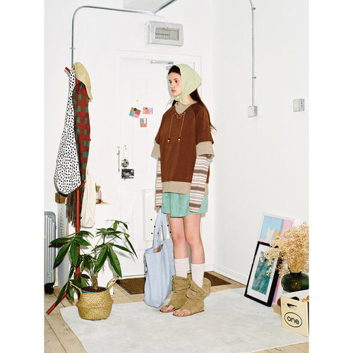 Damen Lagenlook-Sweatshirt mit Schnürung, gestreiften Ärmel-Einsätzen und asymmetrischem Saum Echoarchiv