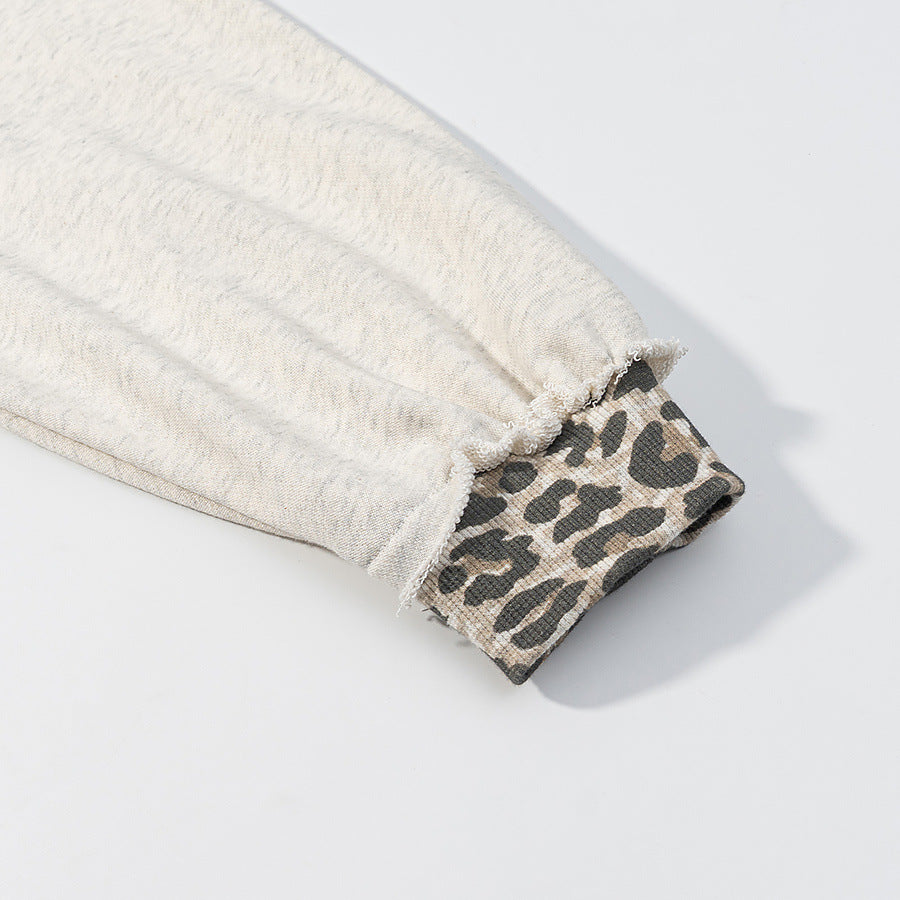 Damen Oversized Kapuzenpullover mit Leoprint-Futter und Destroy-Details Echoarchiv