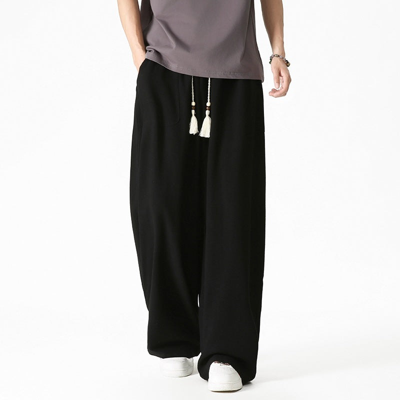 Herren Weit geschnittene Lounge-Hose mit Quasten-Kordel, elastischem Bund und aufgesetzten Taschen Echo Archiv