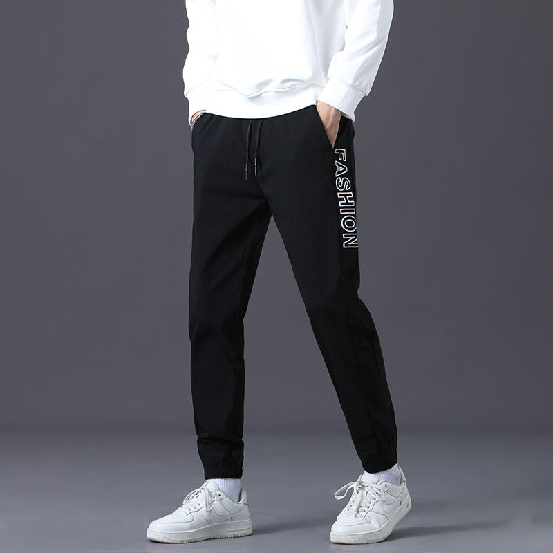 Herren modische Jogginghose mit elastischem Bund und seitlichen Taschen Echoarchiv