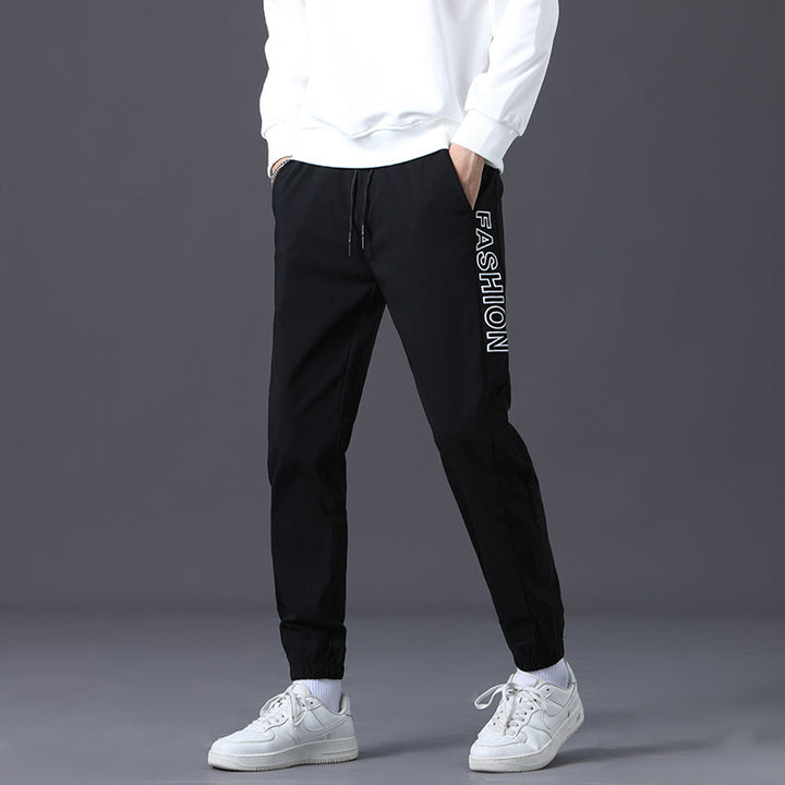 Herren modische Jogginghose mit elastischem Bund und seitlichen Taschen Echoarchiv