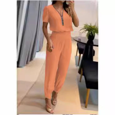 Damen Jumpsuit mit V-Ausschnitt und Gummizug Echoarchiv