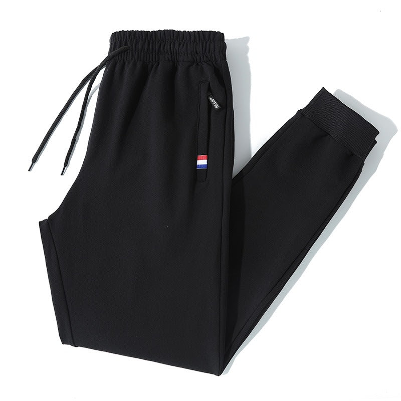 Herren Tapered-Jogginghose mit Tunnelzug, Reißverschlusstasche & Rippbündchen Echo Archiv