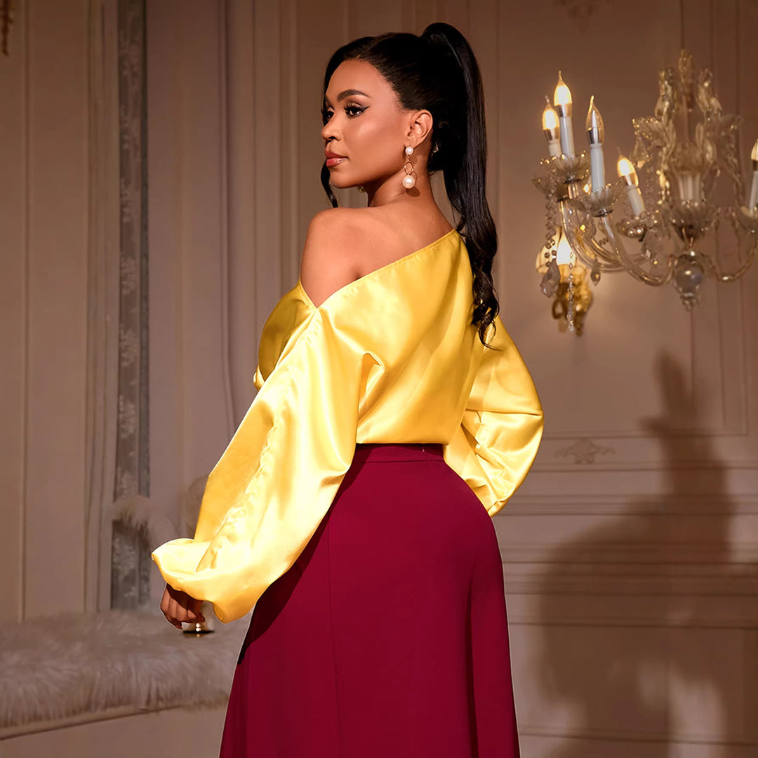 Damen elegantes asymmetrisches Oberteil mit voluminösen Puffärmeln Echo Archiv
