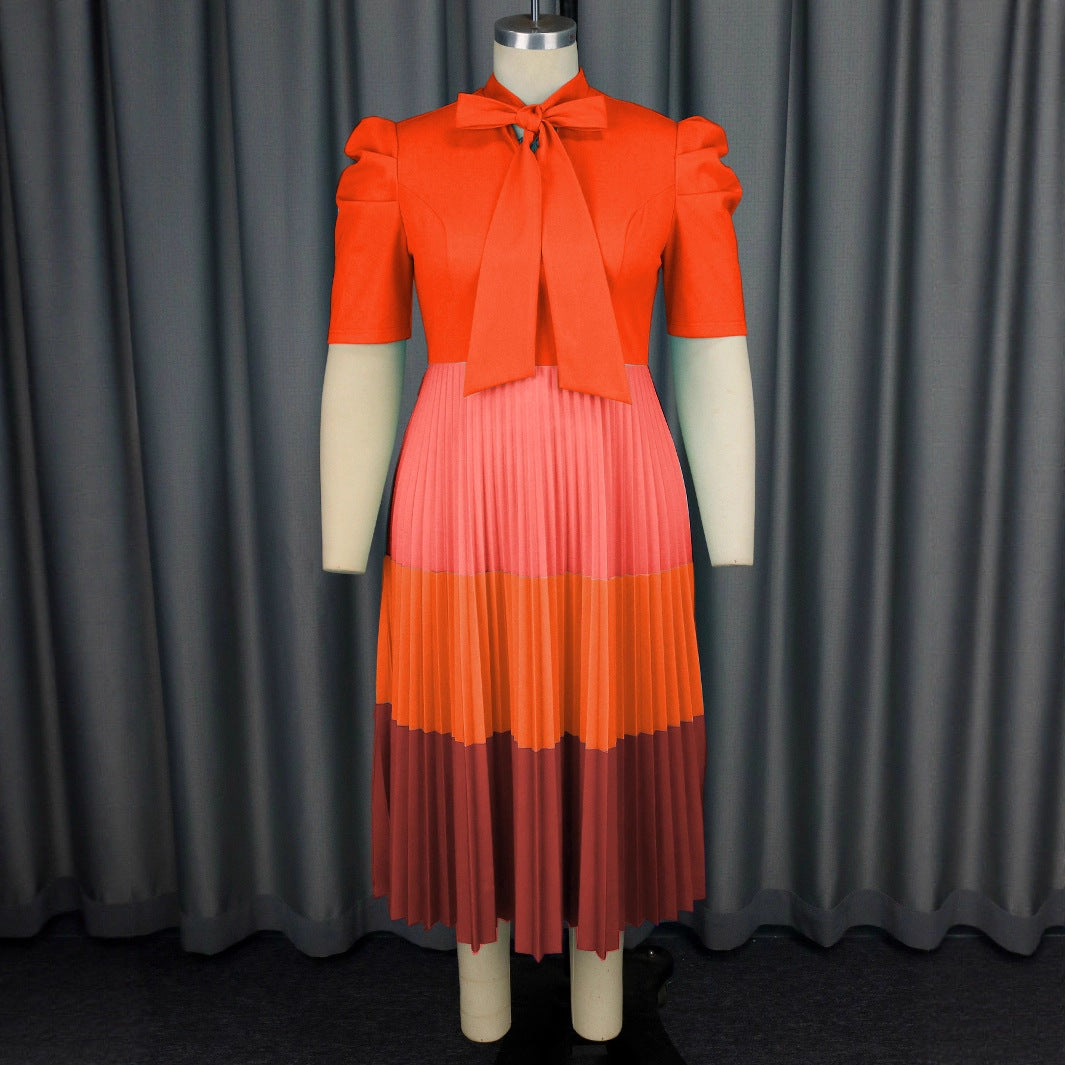 Damen Elegantes Plisseekleid mit Schleifenkragen Echo Archiv