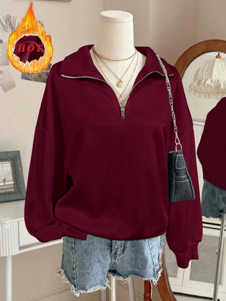 Damen nan Oversize Sweatshirt mit halbem Reißverschluss, Stehkragen und Ballonärmeln Echo Archiv