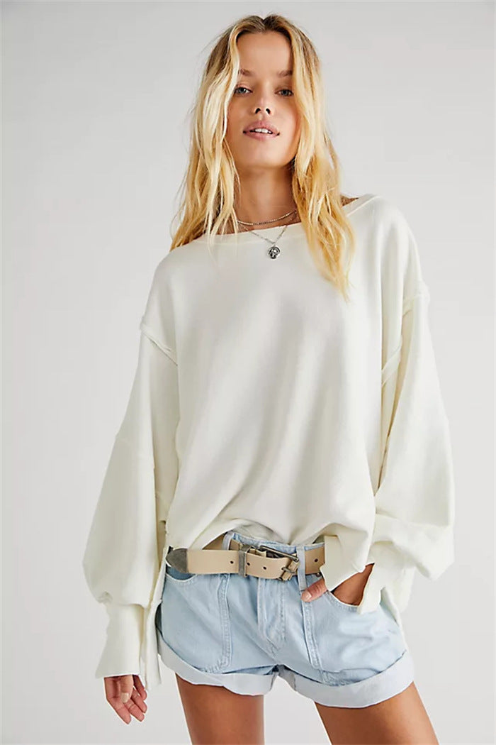 Damen oversized Sweatshirt mit Ballonärmeln, offenen Saumnähten und seitlichen Schlitzen – Avérine