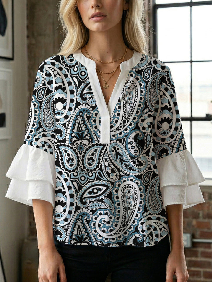 Damen Bluse mit voluminösen Flügelärmel und intensivem Blattmuster Echo Archiv