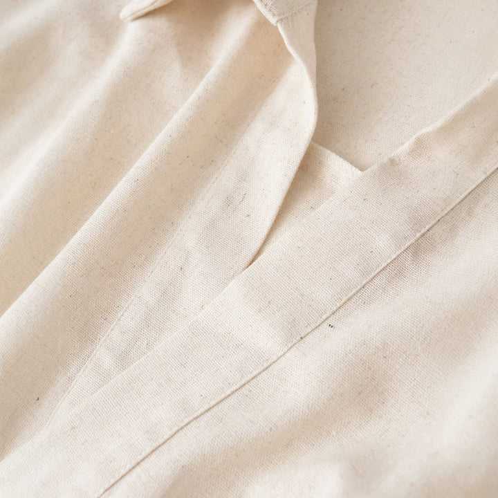 Damen Oversize-Leinenbluse mit offenem V‑Ausschnitt und gerafftem Saum Echoarchiv