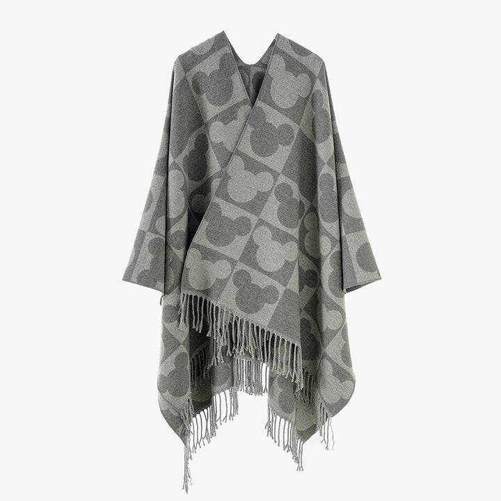 Damen Oversize-Jacquardponcho mit grafischem Kopf-Silhouettenmuster und Fransen – Avérine