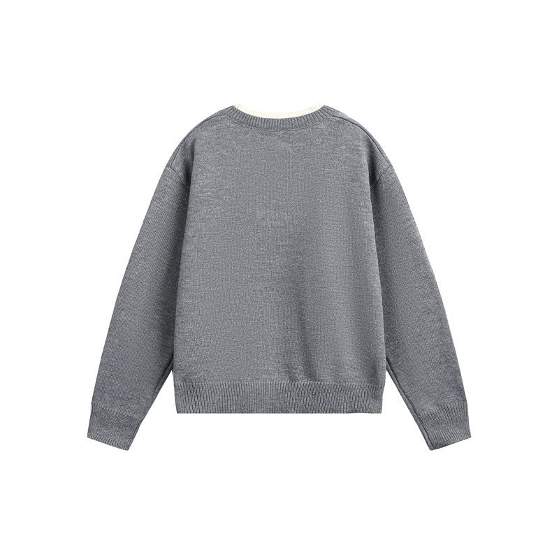 Unisex Grobgestrickter Pullover mit V‑Knopfleiste und Lagenkragen Echoarchiv