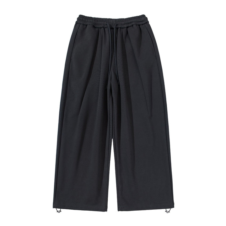 Unisex Weite Cropped Jogginghose mit Tunnelzugbund, Eingrifftaschen und verstellbarem Saum Echoarchiv