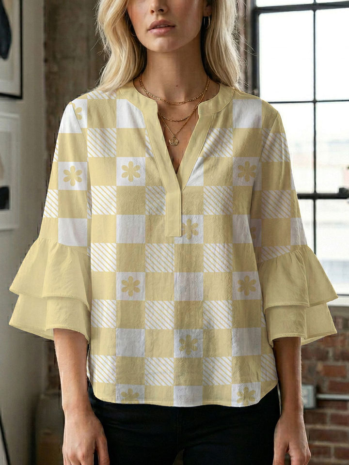 Damen Bluse mit voluminösen Flügelärmel und intensivem Blattmuster Echo Archiv