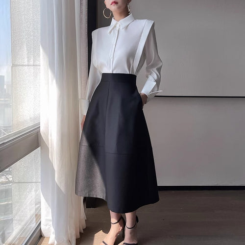 Damen Elegante Bluse mit modernem Schnitt und hoch tailliertem Rock Echoarchiv
