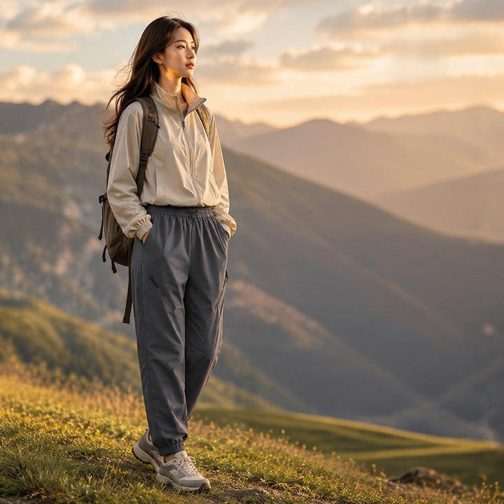 Damen Technische Trekking-Joggerhose mit elastischem Bund, Reißverschlusstaschen und windabweisender Oberfläche Echoarchiv