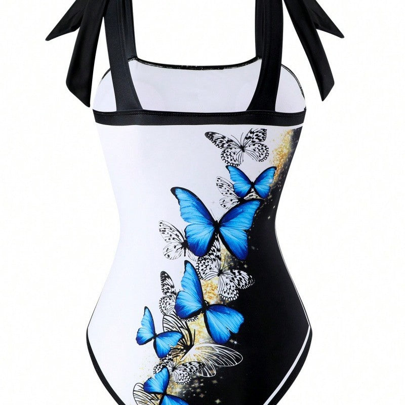 Damen Einteiler Badeanzug mit schickem Wickelrock und Butterfly-Motiv Echo Archiv