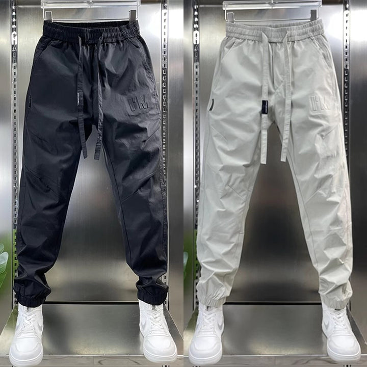 Herren Funktionale wasserabweisende Sporthose Echo Archiv