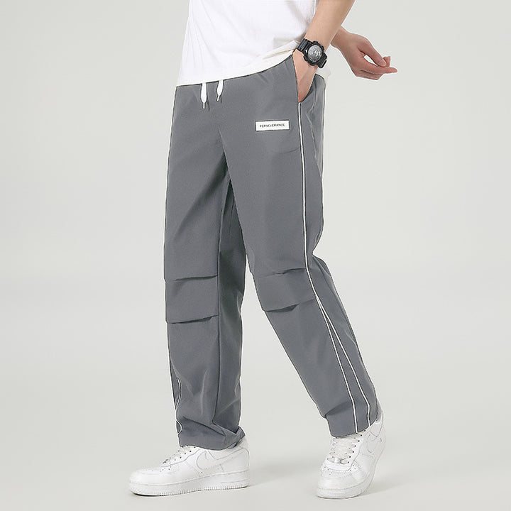 Herren Leichte Technical-Trackhose mit elastischem Bund, Knieabnähern & seitlicher Kontrastpaspel Echo Archiv