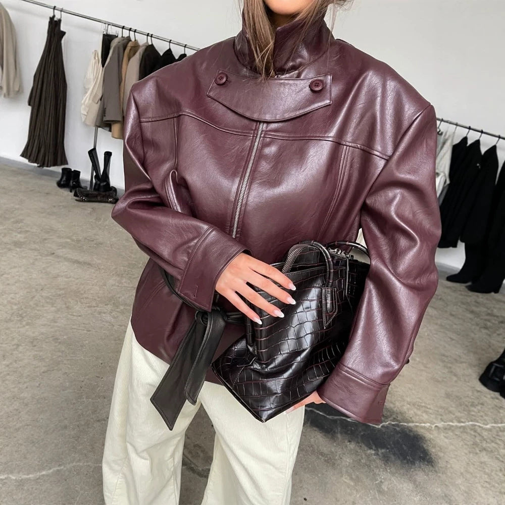 Damen Boxy-Kunstlederjacke mit hohem Stehkragen, Frontzip und Taillenschärpe Echoarchiv