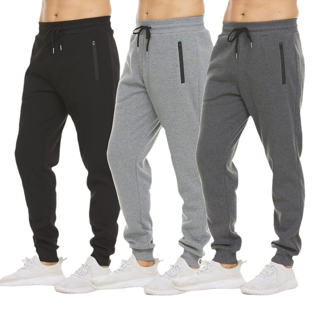 Damen tapered Jogginghose mit elastischem Komfortbund, wasserabweisender Reißverschlusstasche und geripptem Knöchelabschluss – Avérine