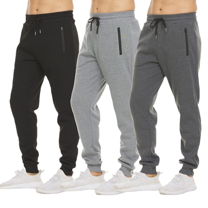 Damen tapered Jogginghose mit elastischem Komfortbund, wasserabweisender Reißverschlusstasche und geripptem Knöchelabschluss – Avérine