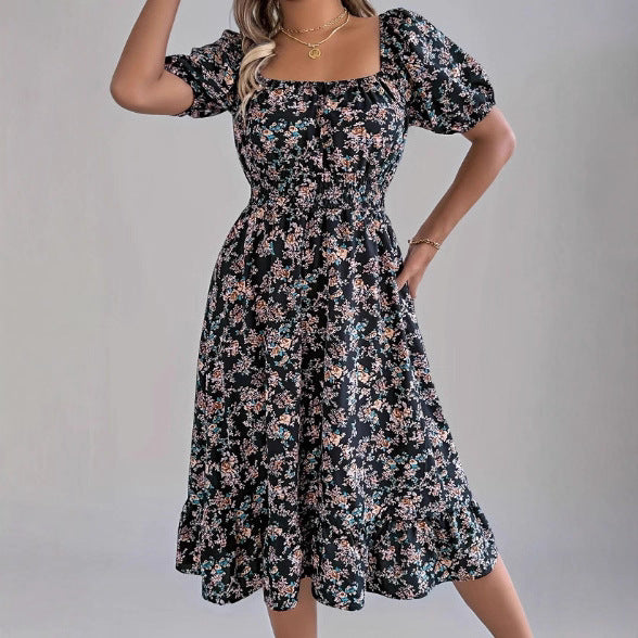 Damen sommerliches Blumenkleid mit Puffärmeln und Rüschensaum Echo Archiv