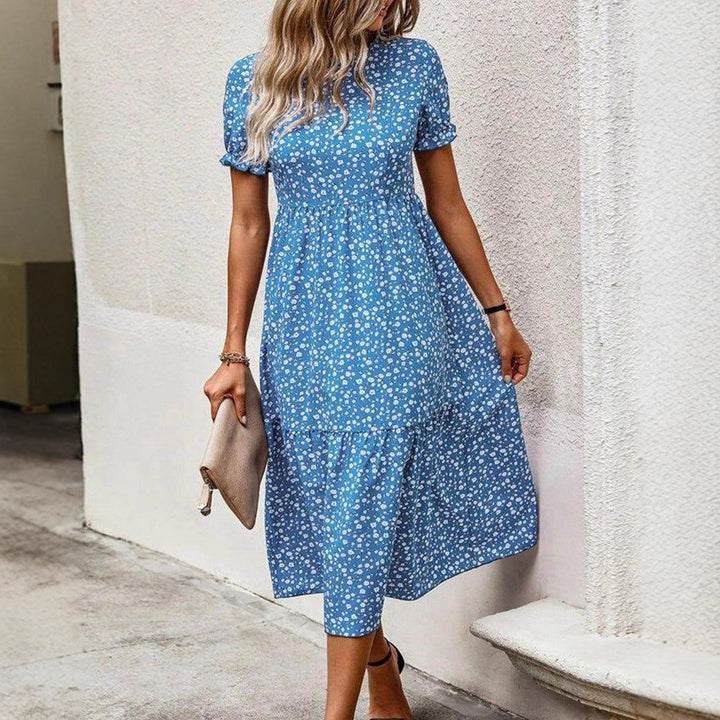 Damen nan luftiges Midikleid mit durchgehendem Blumenmuster, geraffter Taillennaht und kurzen Puffärmeln Echo Archiv