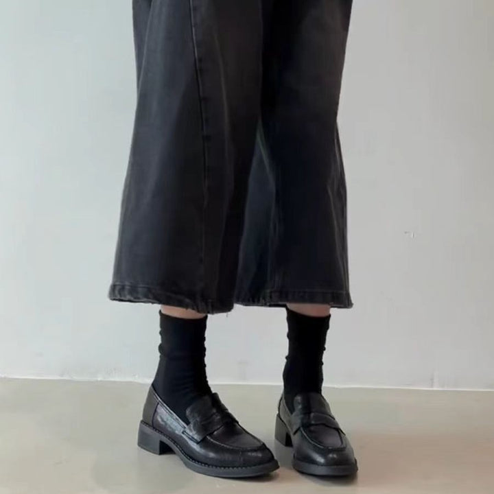 Damen Leder-Penny‑Loafer mit gesteppter Kappnaht und niedrigem Blockabsatz Echo Archiv