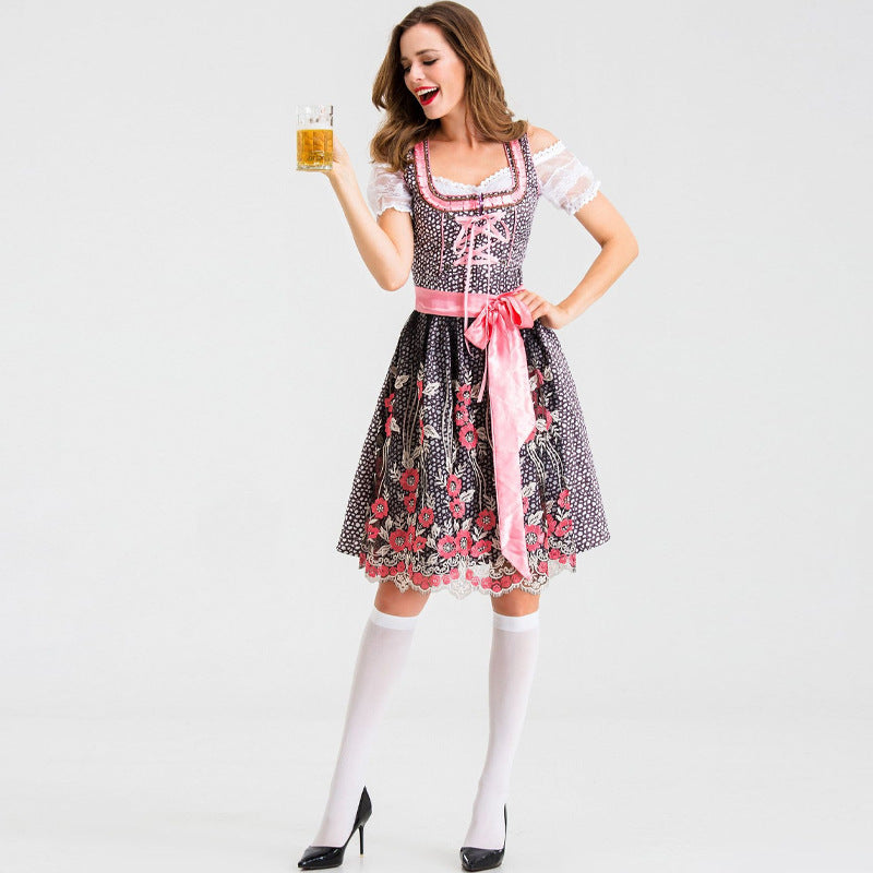 Damen nan traditionelles Kurzdirndl mit Spitzenärmeln, Schnürung und floraler Schürze Echo Archiv