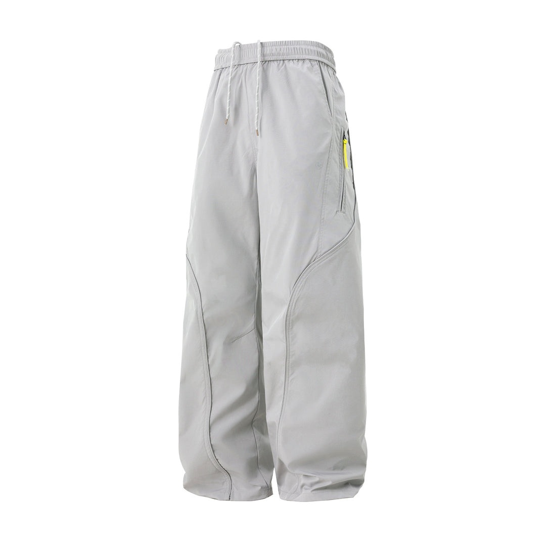 Unisex Weite Nylon-Freizeithose mit Tunnelzug und Reißverschlusstasche Echo Archiv